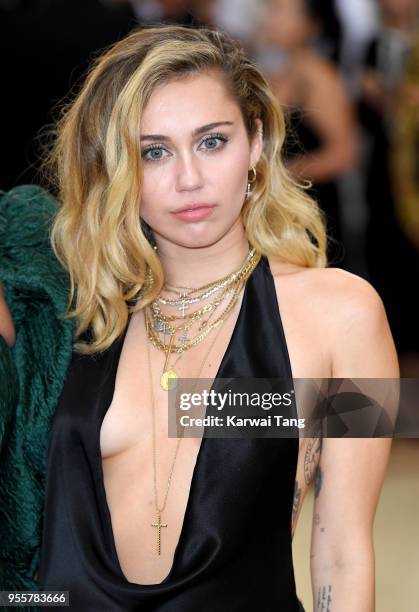 Miley Cyrus attends Heavenly Bodies: Fashion & The Catholic Imagination Costume Institute Gala at the Metropolitan Museum of Art on May 7, 2018 in...