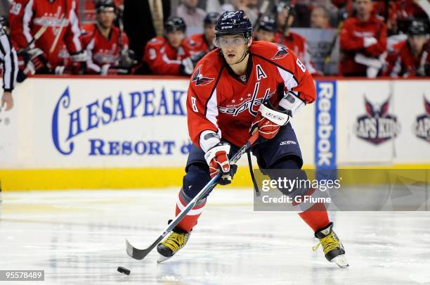 Alex Ovechkin of the Washington Capitals handles the puck against the Carolina Hurricanes at the Verizon Center on December 28, 2009 in Washington,...