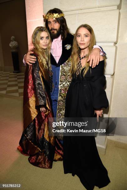 Ashley Olsen, Jared Leto and Mary-Kate Olsen attend the Heavenly Bodies: Fashion & The Catholic Imagination Costume Institute Gala at The...