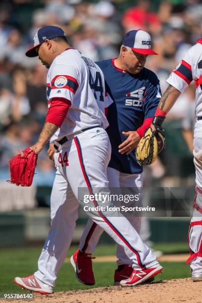 Chicago White Sox manager Rick Renteria takes Chicago White Sox relief pitcher Bruce Rondon out during a game between the Minnesota Twins the Chicago...