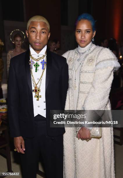 Pharrell Williams and Helen Lasichanh attend the Heavenly Bodies: Fashion & The Catholic Imagination Costume Institute Gala at The Metropolitan...