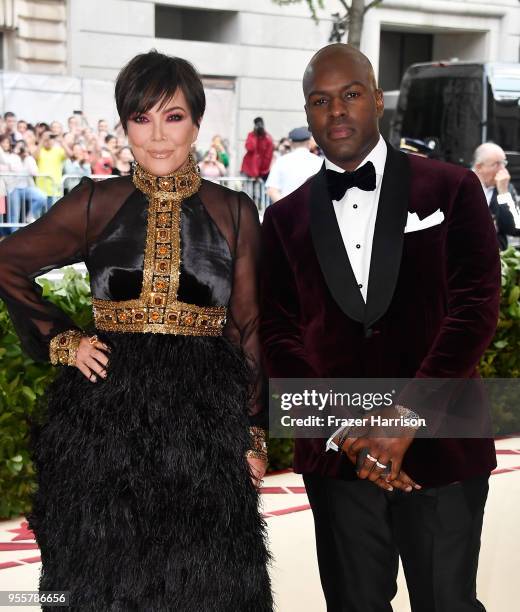 Kris Jenner and Corey Gamble attend the Heavenly Bodies: Fashion & The Catholic Imagination Costume Institute Gala at The Metropolitan Museum of Art...