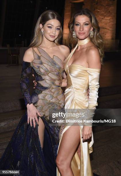 Gigi Hadid and Gisele Bundchen attend the Heavenly Bodies: Fashion & The Catholic Imagination Costume Institute Gala at The Metropolitan Museum of...