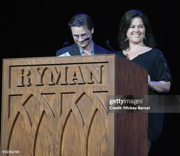 Songwriter Josh Kear and co-owner and GM of Big Yellow Dog Music, Carla Wallace speak onstage during the 3rd Annual AIMP Awards at Ryman Auditorium...