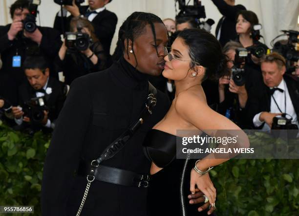 Kylie Jenner and Travis Scott arrive for the 2018 Met Gala on May 7 at the Metropolitan Museum of Art in New York. The Gala raises money for the...