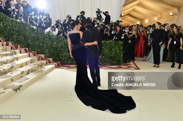Kylie Jenner and Travis Scott arrive for the 2018 Met Gala on May 7 at the Metropolitan Museum of Art in New York. - The Gala raises money for the...