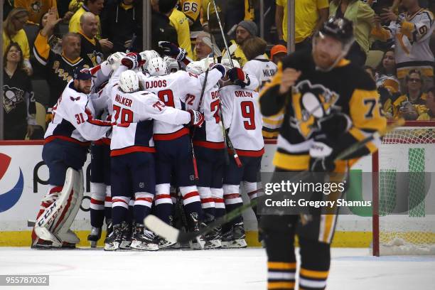 The Washington Capitals celebrate moving on to the Eastern Conference Finals after a 2-1 overtime win behind Patric Hornqvist of the Pittsburgh...