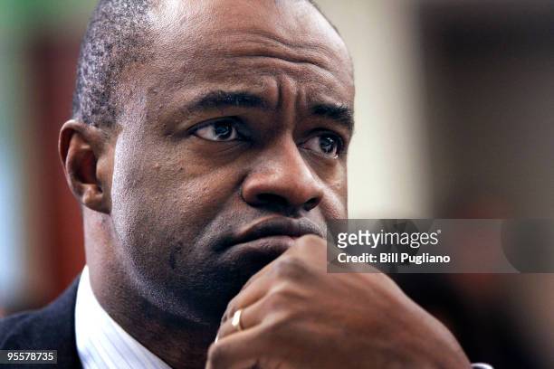 DeMaurice Smith, Executive Director of the NFL Players Association, waits to speak as a witness at a U.S. House Judiciary field hearing January 4,...