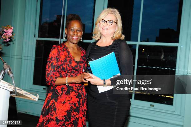 First Lady of New York City Chirlane McCray and journalist Cynthia McFadden pose onstage with the Corporate Advocate Award during the 2018 Change...