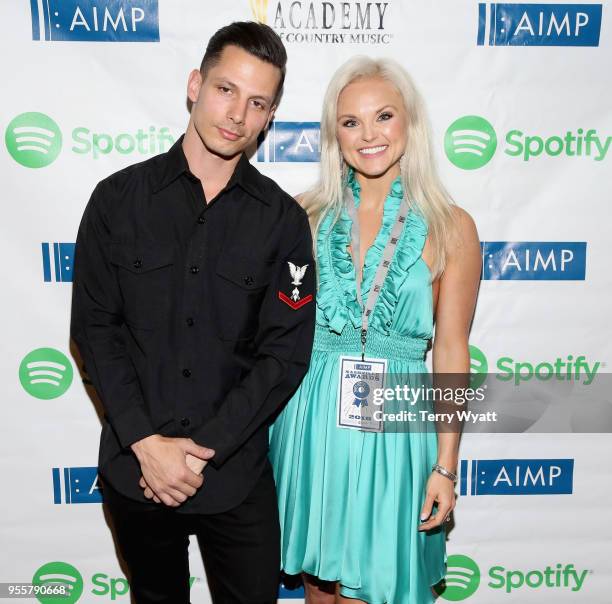 Artist Devin Dawson and Brittany Schaffer, Head/Artist & Label Services of Spotify Nashville attend the 3rd Annual AIMP Awards at Ryman Auditorium on...