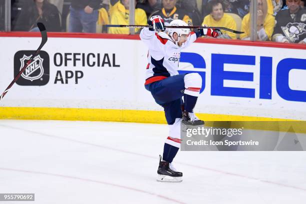 Washington Capitals Center Evgeny Kuznetsov celebrates after scoring the game winning goal during the overtime period. The Washington Capitals went...