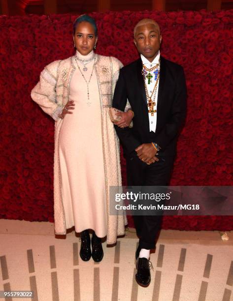 Helen Lasichanh and Pharrell Williams attend the Heavenly Bodies: Fashion & The Catholic Imagination Costume Institute Gala at The Metropolitan...