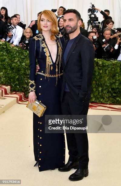 Emma Stone and Nicolas Ghesquière attend the Heavenly Bodies: Fashion & The Catholic Imagination Costume Institute Gala at The Metropolitan Museum of...