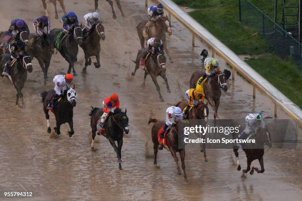 Jockey Corey J. Lanerie rides Promises Fulfilled an leads the field down the front stretch during the 144th running of the Kentucky Derby at...