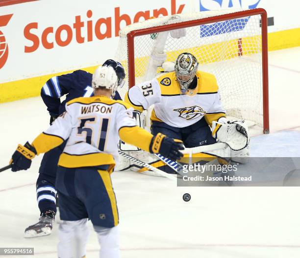 Pekka Rinne of the Nashville Predators makes a save off Bryan Little of the Winnipeg Jets in Game Six of the Western Conference Second Round during...