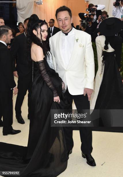 Grimes and Elon Musk attends the Heavenly Bodies: Fashion & The Catholic Imagination Costume Institute Gala at The Metropolitan Museum of Art on May...