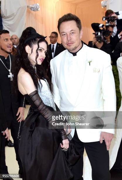 Grimes and Elon Musk attends the Heavenly Bodies: Fashion & The Catholic Imagination Costume Institute Gala at The Metropolitan Museum of Art on May...