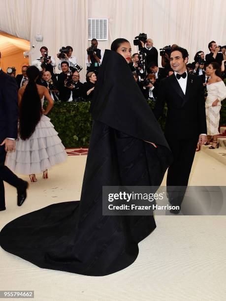 Imaan Hammam and Zac Posen attend the Heavenly Bodies: Fashion & The Catholic Imagination Costume Institute Gala at The Metropolitan Museum of Art on...