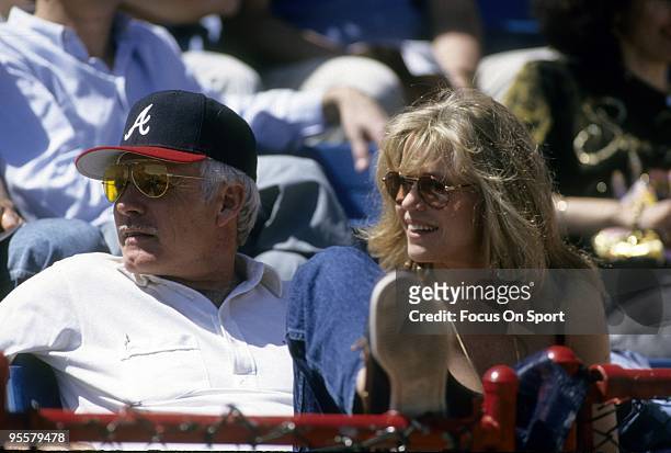 Atlanta Braves owner Ted Turner with his wife Jane Fonda watching the Atlanta Braves play a Major League Baseball game circa 1980's at Atlanta Fulton...