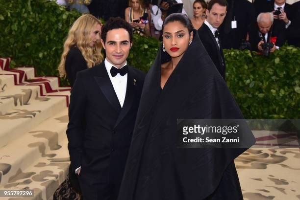 Zac Posen and Imaan Hammam attend the Heavenly Bodies: Fashion & The Catholic Imagination Costume Institute Gala at The Metropolitan Museum of Art on...