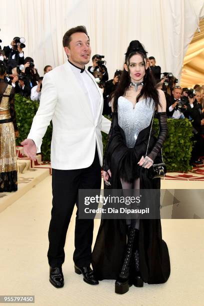 Elon Musk and Grimes attend the Heavenly Bodies: Fashion & The Catholic Imagination Costume Institute Gala at The Metropolitan Museum of Art on May...