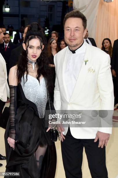 Grimes and Elon Musk attend the Heavenly Bodies: Fashion & The Catholic Imagination Costume Institute Gala at The Metropolitan Museum of Art on May...