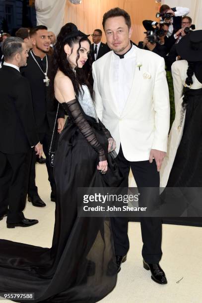 Grimes and Elon Musk attend the Heavenly Bodies: Fashion & The Catholic Imagination Costume Institute Gala at The Metropolitan Museum of Art on May...