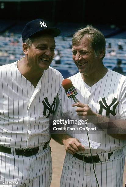 S: Roger Maris and Mickey Mantle retired New York Yankees talks for the NBC tv cameras before a Major League Baseball game circa mid 1980's at Yankee...