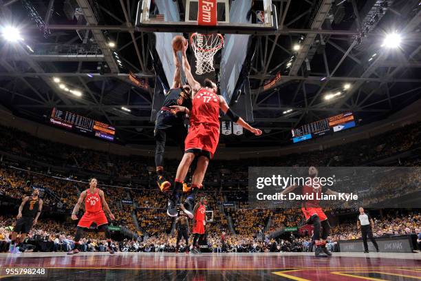 Jonas Valanciunas of the Toronto Raptors blocks the shot by George Hill of the Cleveland Cavaliers in Game Four of the Eastern Conference Semifinals...