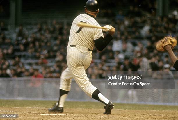 S: Outfielder Mickey Mantle of the New York Yankees swings at a pitch during a circa 1960's Major League Baseball game at Yankee Stadium in Bronx,...