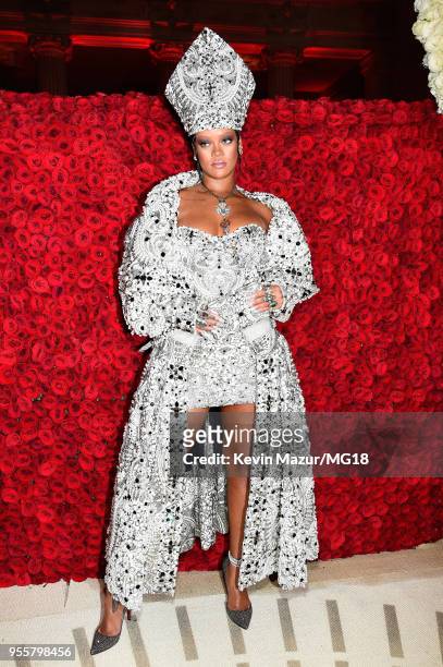 Met Gala Host Rihanna attends the Heavenly Bodies: Fashion & The Catholic Imagination Costume Institute Gala at The Metropolitan Museum of Art on May...