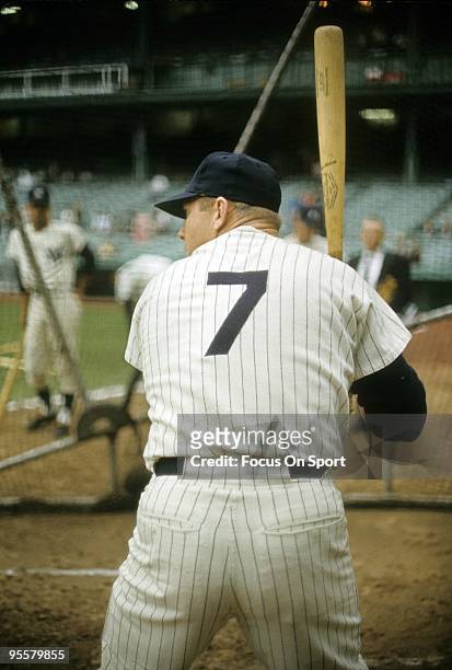 S: Outfielder Mickey Mantle of the New York Yankees in the batting cage to hit during batting practice before a circa 1960's Major League Baseball...