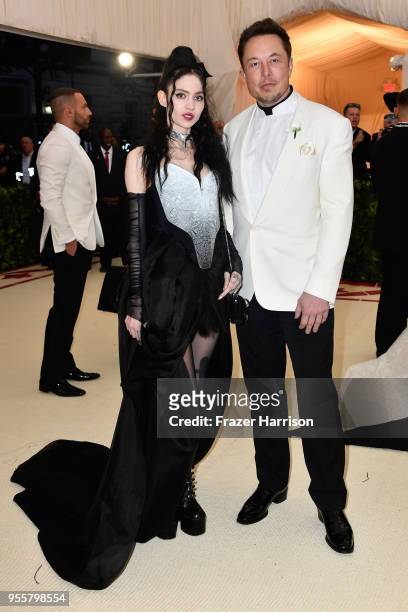 Grimes and Elon Musk attend the Heavenly Bodies: Fashion & The Catholic Imagination Costume Institute Gala at The Metropolitan Museum of Art on May...