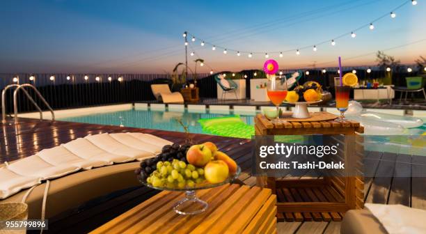 empty place ready for pool party - pool party night stock pictures, royalty-free photos & images