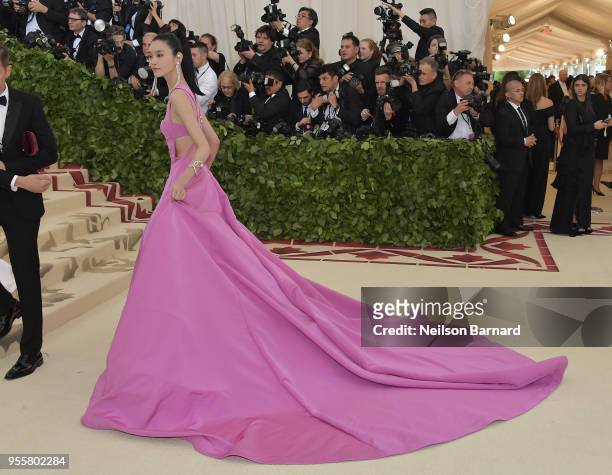 Ming Xi attends the Heavenly Bodies: Fashion & The Catholic Imagination Costume Institute Gala at The Metropolitan Museum of Art on May 7, 2018 in...