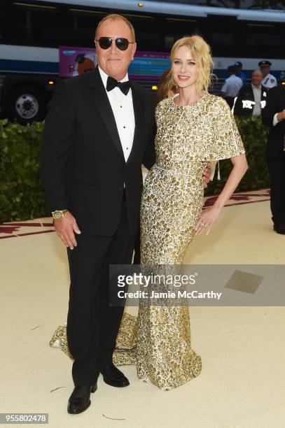 Michael Kors and Noami Watts attend the Heavenly Bodies: Fashion & The Catholic Imagination Costume Institute Gala at The Metropolitan Museum of Art...