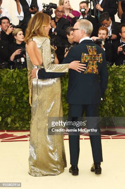 Tommy Hilfiger and Dee Hilfiger attend the Heavenly Bodies: Fashion & The Catholic Imagination Costume Institute Gala at The Metropolitan Museum of...