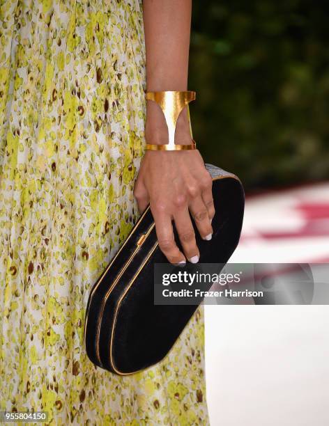 Huma Abedin, purse detail, attends the Heavenly Bodies: Fashion & The Catholic Imagination Costume Institute Gala at The Metropolitan Museum of Art...