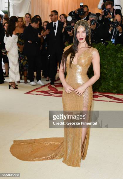 Olivia Munn attends the Heavenly Bodies: Fashion & The Catholic Imagination Costume Institute Gala at the Metropolitan Museum of Art on May 7, 2018...