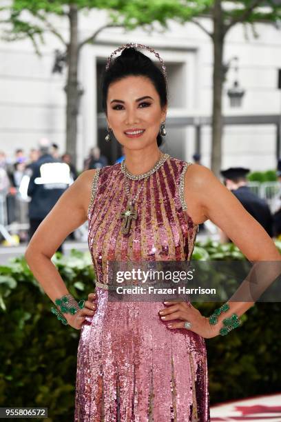 Wendi Deng Murdoch attends the Heavenly Bodies: Fashion & The Catholic Imagination Costume Institute Gala at The Metropolitan Museum of Art on May 7,...