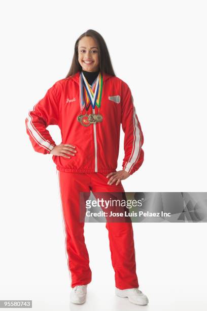 mixed race athlete wearing medals - sportsperson medal stock pictures, royalty-free photos & images