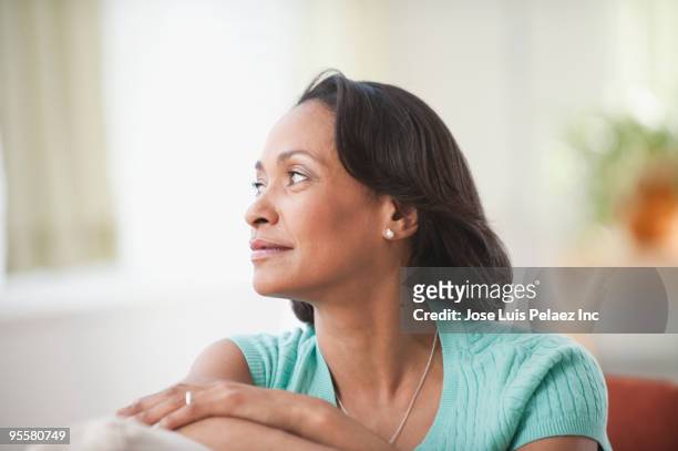 mixed race woman smiling - 40 2009 stock pictures, royalty-free photos & images