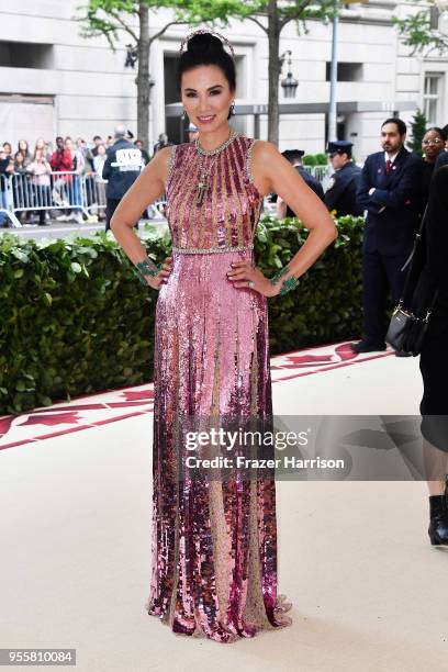 Wendi Deng Murdoch attends the Heavenly Bodies: Fashion & The Catholic Imagination Costume Institute Gala at The Metropolitan Museum of Art on May 7,...