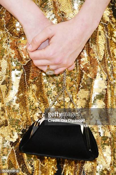 Evan Rachel Wood handbag detail at the Heavenly Bodies: Fashion & The Catholic Imagination Costume Institute Gala at The Metropolitan Museum of Art...