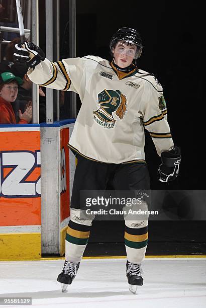 Jake Worrad of the London Knights salutes the crowd upon being named one of the stars in a game against the Sarnia Sting on December 31, 2009 at the...