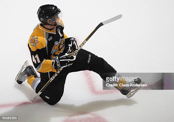 Jordan Hill of the Sarnia Sting stretches in the warm-up prior to a game against the London Knights on December 31, 2009 at the John Labatt Centre in...
