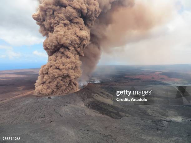 Smoke rises from Kilauea volcano as Dozens of structures, including at least nine homes, have been destroyed by scorching lava flows following a...