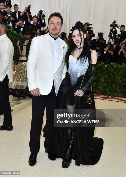 Elon Musk and Grimes arrive for the 2018 Met Gala on May 7 at the Metropolitan Museum of Art in New York. - The Gala raises money for the...