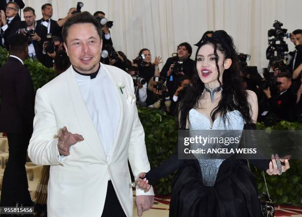 Elon Musk and Grimes arrive for the 2018 Met Gala on May 7 at the Metropolitan Museum of Art in New York. - The Gala raises money for the...