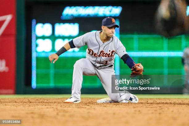 Detroit Tigers shortstop Jose Iglesias waits to tag Texas Rangers first baseman Ronald Guzman during the game between the Texas Rangers and the...